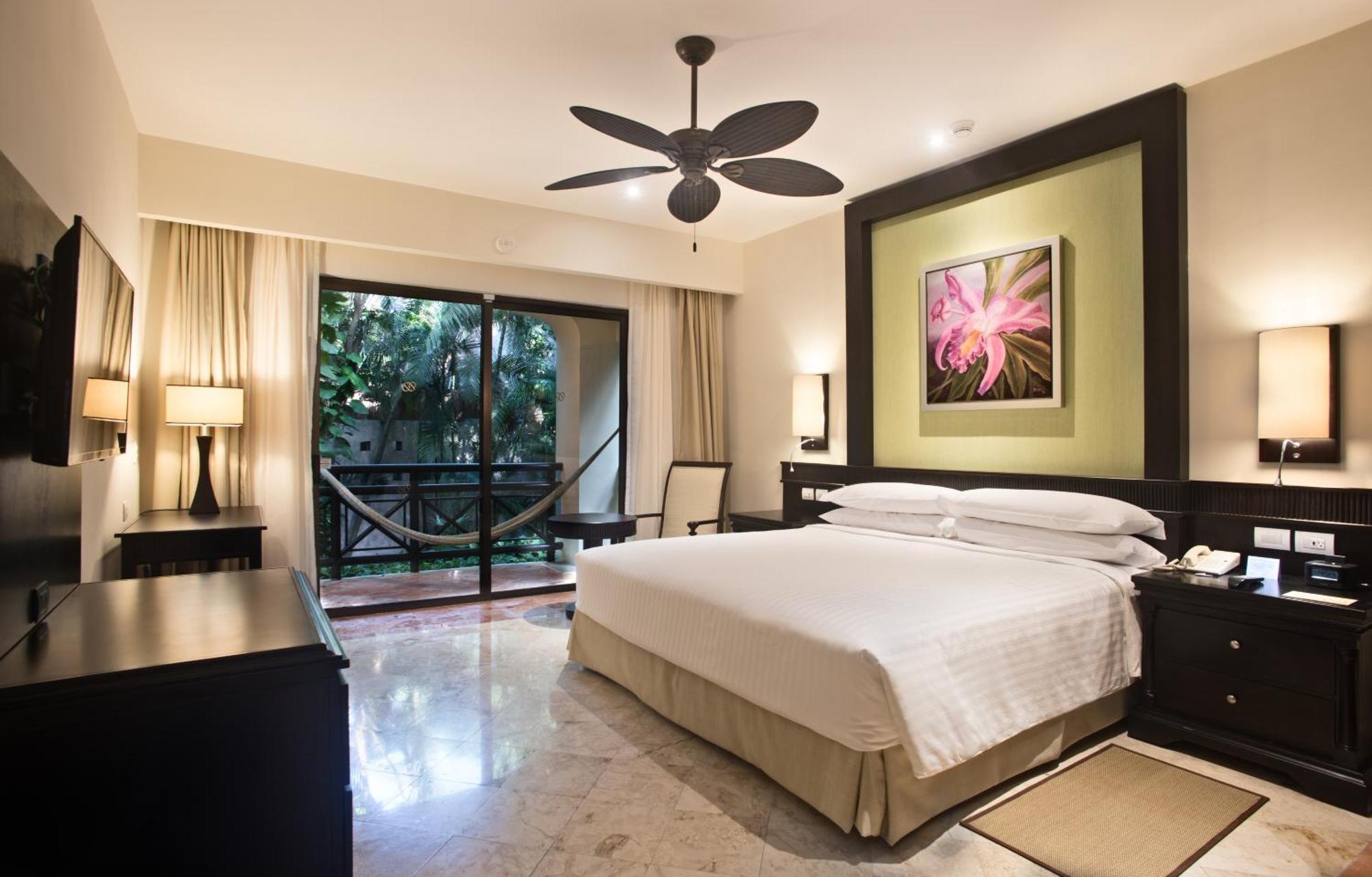 Occidental At Xcaret Destination Otel Playa del Carmen Dış mekan fotoğraf A bedroom at the Hard Rock Hotel
